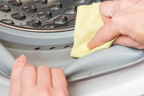 washing machine leaking from bottom during spin cycle